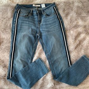 Jeans with black and white striped side